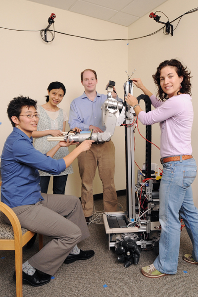  The robot Cody inspired by Ting’s collaboration with Madeleine Hackney. The project aimed to develop principles for designing a robot that used physical interactions to assist gait. From left to right: computer scientist C. Karen Liu, roboticist Charlie Kemp, and rehabilitation scientist Madeleine Hackney. Photo Credit: Georgia Tech
