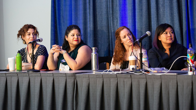 Four women sitting at a table for a Professional Development Workshop panel at Neuroscience 2018.