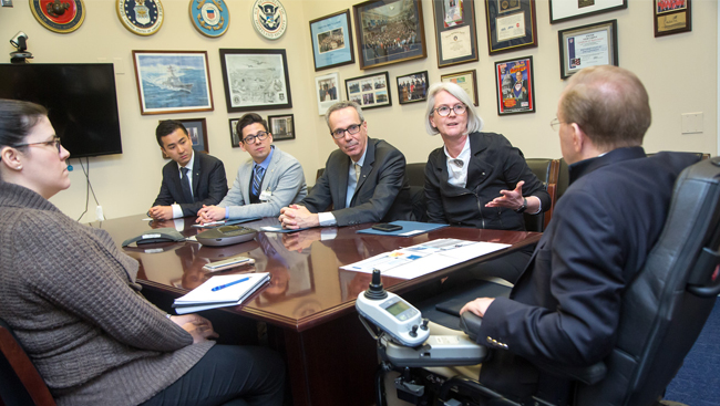 Photo of several people sitting around a conference table from SfN's Capitol Hill Day 2018.