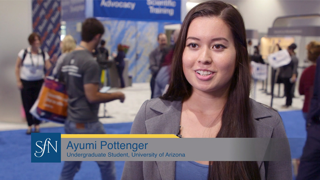 Ayumi Pottenger on the exhibit floor at Neuroscience 2018.