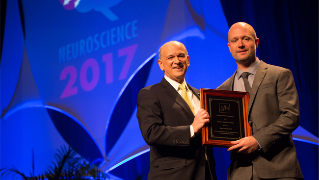 Garret Stuber receiving the Jacob P. Waletzky Award in 2017.