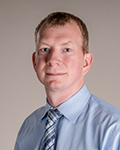 headshot of curtis neveu