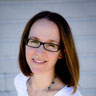 Headshot of Christa Studzinski wearing a white shirt.